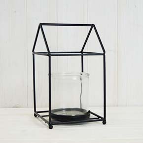 Gorgeous black house shape lantern with glass insert. Perfect for a gift or as a decoration in your home! detail page